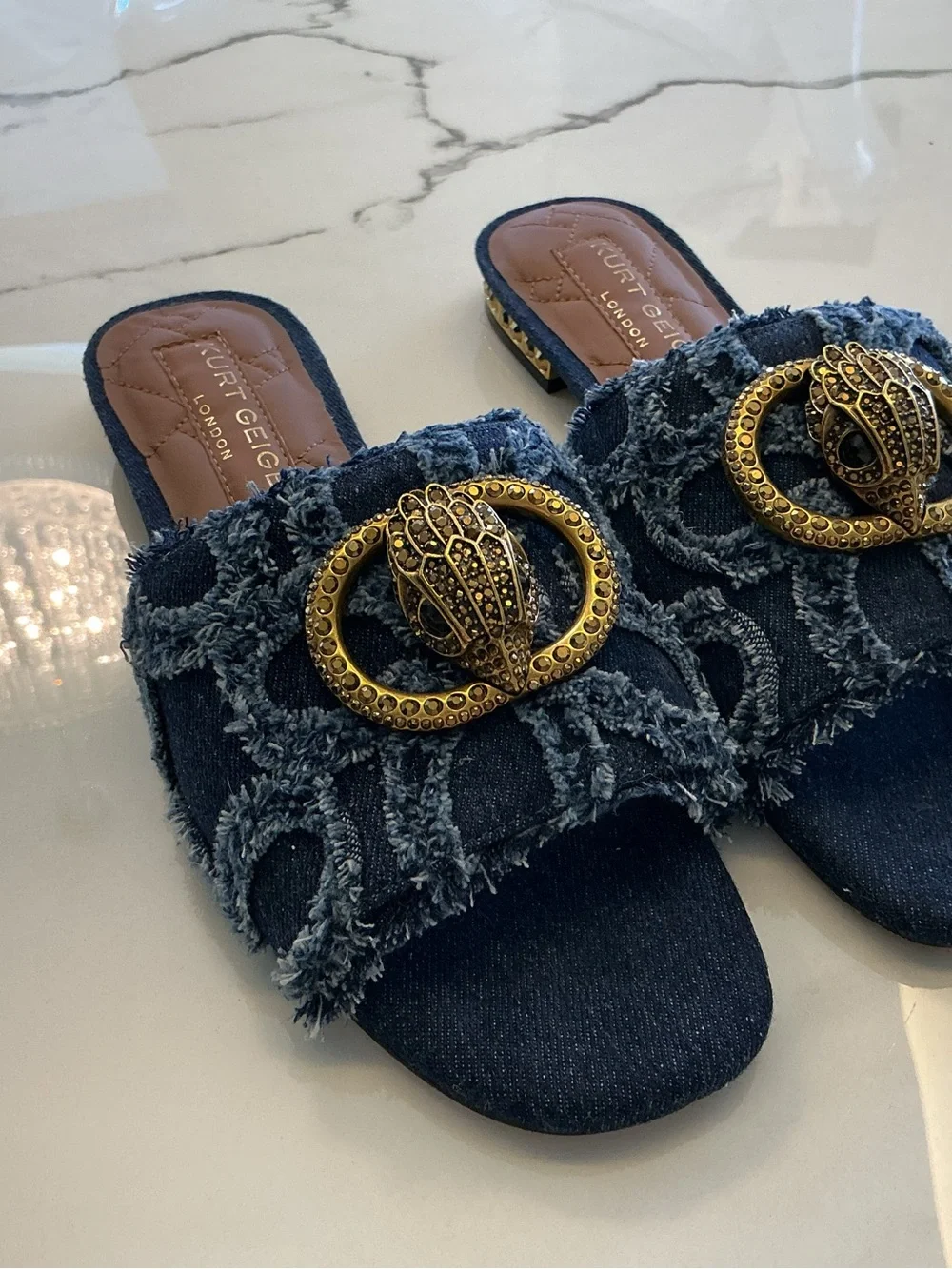 Kurt Geiger Distressed Denim Slide Mules with Gold Emblem
